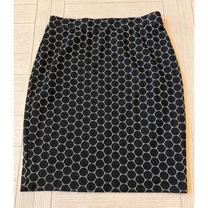 Elle black & white geometric print, knee length straight skirt. Poly, spandex. M